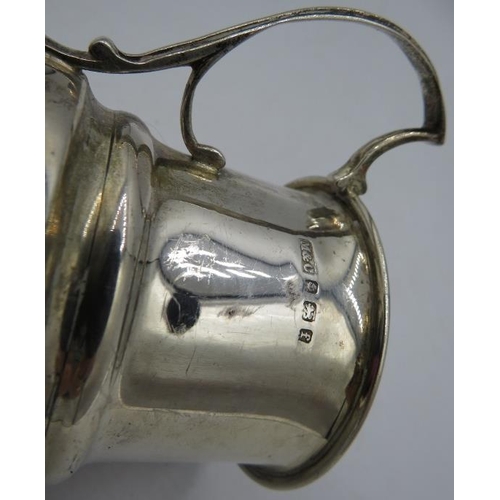 443 - A silver Christening mug with gilded interior. Monogramed Birmingham 1905. 2.3 troy oz/72grams.
Cond... 