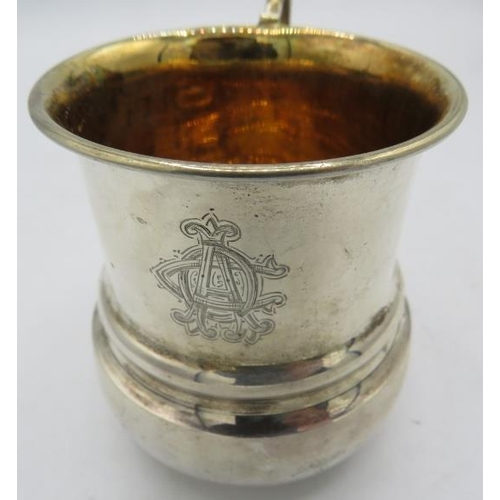 443 - A silver Christening mug with gilded interior. Monogramed Birmingham 1905. 2.3 troy oz/72grams.
Cond... 