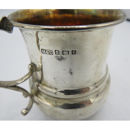 443 - A silver Christening mug with gilded interior. Monogramed Birmingham 1905. 2.3 troy oz/72grams.
Cond... 