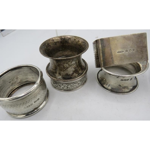 474 - A collection of 5 silver napkin rings. All fully hallmarked. a white metal Indian ashtray (marks to ... 