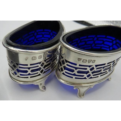 479 - A matched set of 4 silver salts with pierced decoration. All with blue liners. Birmingham 1896 and C... 