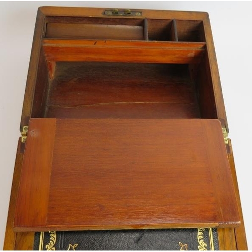 48 - A 19th century walnut writing slope with brass mounts and fitted interior. 29.5cm x 23.5cm x 15cm. 
... 