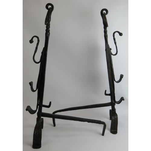 49 - A pair of large French antique wrought iron fire andirons in the 16th/17th century style. Overall he... 