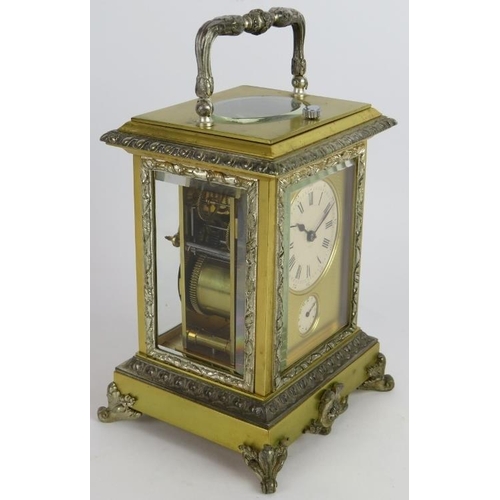 54 - An ornate gilt and silver plated brass Repeater carriage clock with strike and alarm movement, keys ... 