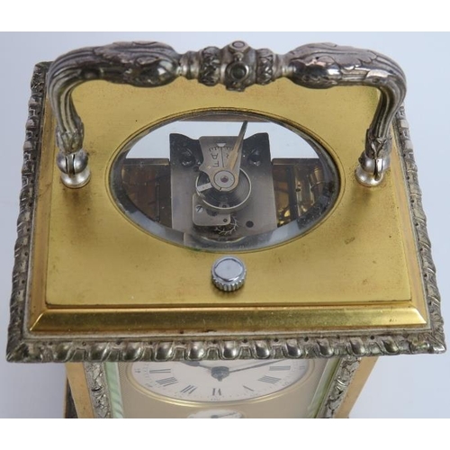 54 - An ornate gilt and silver plated brass Repeater carriage clock with strike and alarm movement, keys ... 