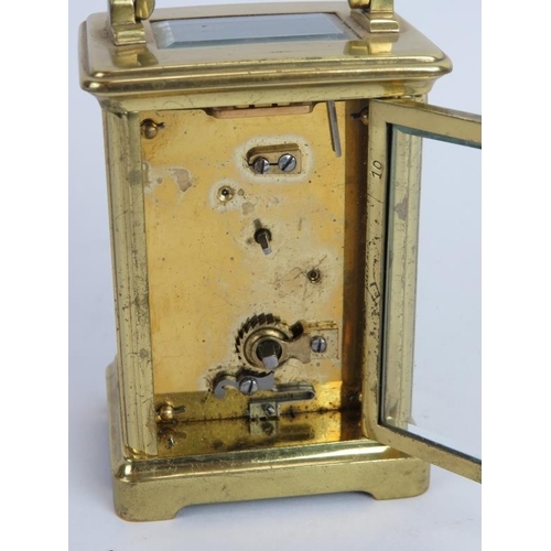 55 - A brass cased 8 day carriage clock with enamel dial. Overall height: 15cm . No key.
Condition report... 