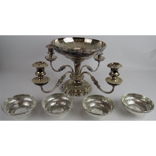 58 - A mixed lot of silver plate including a candelabra, fruit set, hip flasks, trophies, sauce bottle, c... 