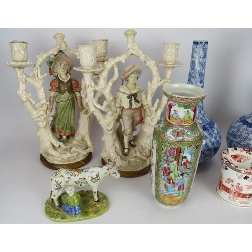 59 - Mixed ceramics to include a pair of continental figural candlesticks, Chinese Famille rose vase, sha... 