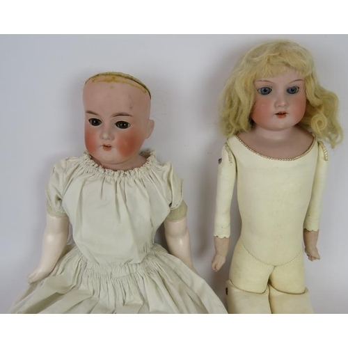 65 - Two antique Armande Marseille Bisque headed dolls. One leather bodied marked Flora Dora (50cm) and o... 