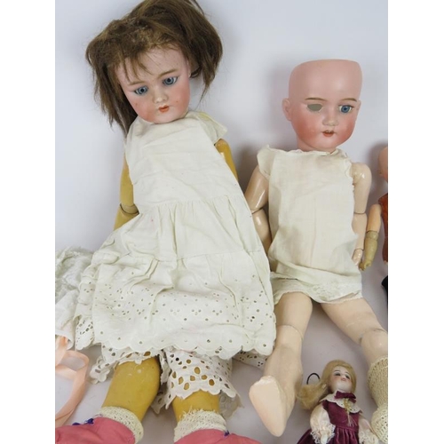 68 - Four mixed bisque headed dolls including one Heubach, one Simon Halbig and one MB Japan. Plus a Simo... 