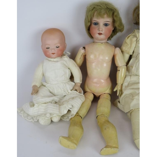 72 - Four good quality antique dolls including a Majestic leather bodied doll, Armande Marseille 370, Heu... 