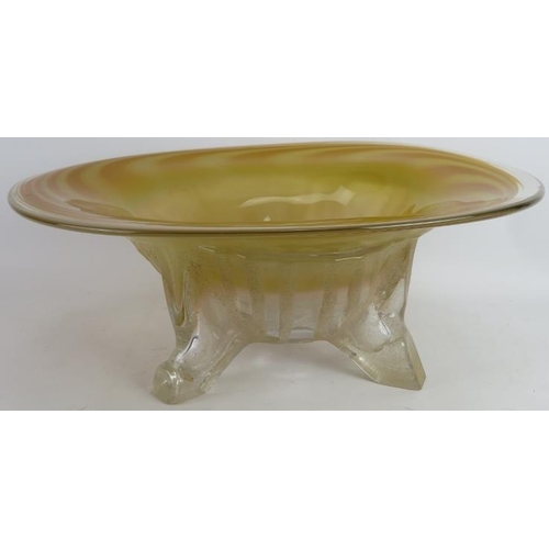 79 - A large blown glass bowl by Neal Drobnis (American). Swirled amber bowl on tripod sand finished legs... 