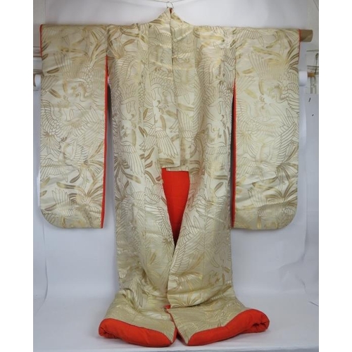 83 - A vintage Japanese silk wedding Kimono, the body being gold threaded with bird pattern fabric, red s... 