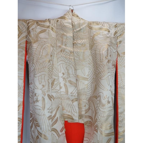 83 - A vintage Japanese silk wedding Kimono, the body being gold threaded with bird pattern fabric, red s... 