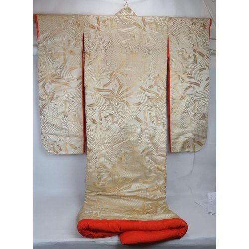 83 - A vintage Japanese silk wedding Kimono, the body being gold threaded with bird pattern fabric, red s... 