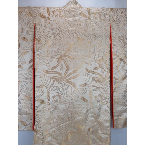 83 - A vintage Japanese silk wedding Kimono, the body being gold threaded with bird pattern fabric, red s... 