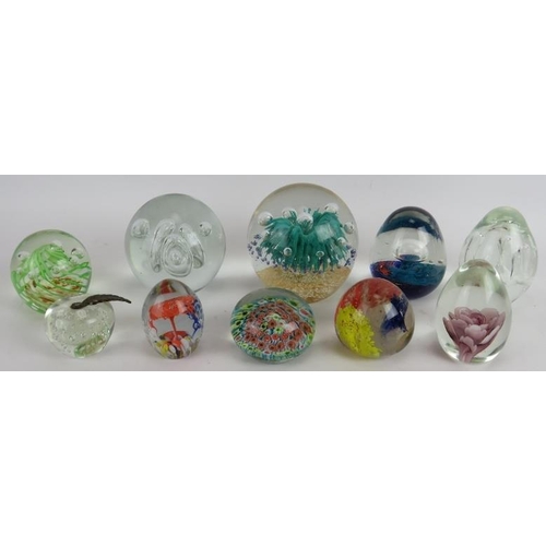 85 - Ten mixed glass paperweights, all unsigned. Largest: 11.5cm high. (10).
Condition report: Apple weig... 