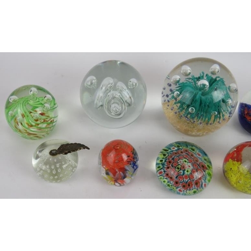 85 - Ten mixed glass paperweights, all unsigned. Largest: 11.5cm high. (10).
Condition report: Apple weig... 