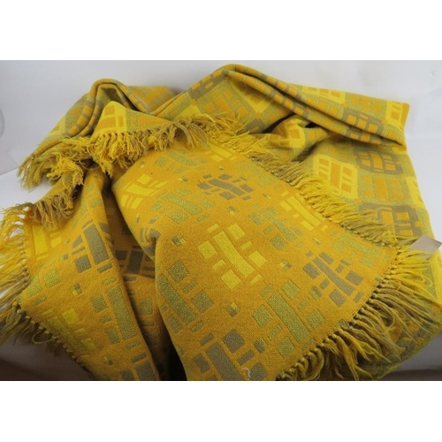 93 - A vintage Welsh wool blanket, mustard yellow with block repeat pattern. Size: 230cm x 260cm,
Conditi... 