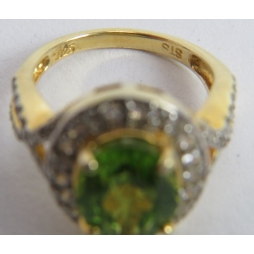 452 - Peridot gemstone ring, 17mm x 13mm portrait setting, ring size M/N, 14k yellow gold 925.