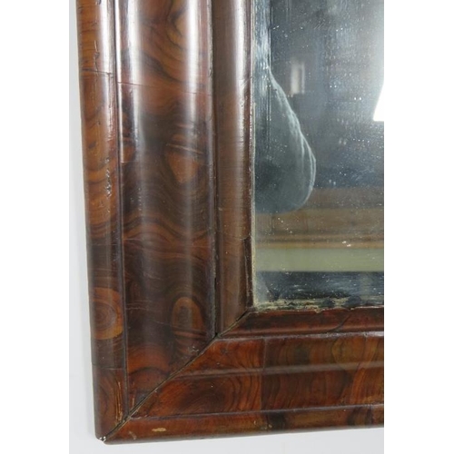 716 - A 17th century William & Mary Period walnut oyster veneer cushion frame wall mirror, retaining the o... 