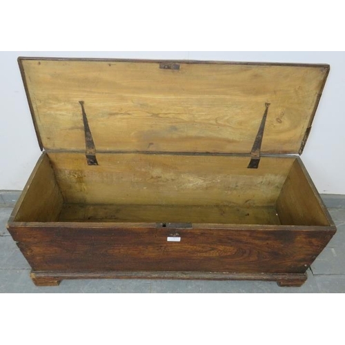 717 - An early 19th century elm trunk of small proportions, on bracket feet. 
Condition report: Various ma... 