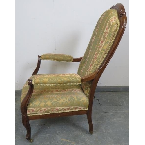 726 - A vintage French oak show-wood open-sided armchair, upholstered in tapestry patterned material with ... 