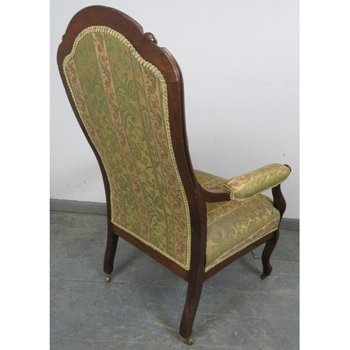 726 - A vintage French oak show-wood open-sided armchair, upholstered in tapestry patterned material with ... 