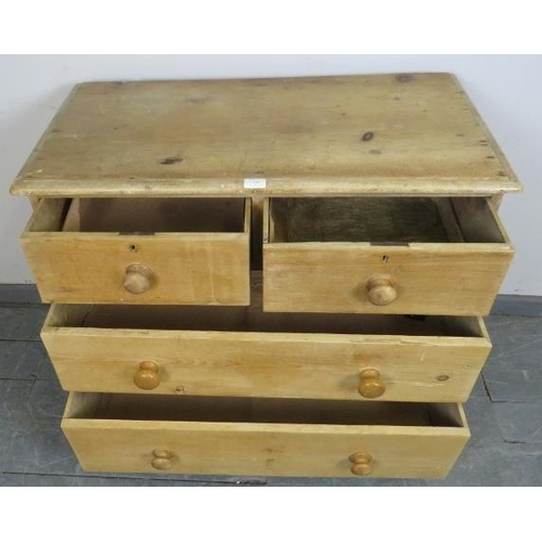 730 - A small Victorian stripped pine chest of two short over two long drawers with turned wooden knob han... 