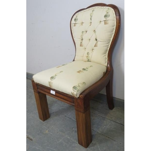 731 - A small Victorian walnut spoon-back chair, reupholstered in a contemporary buttoned material, on squ... 