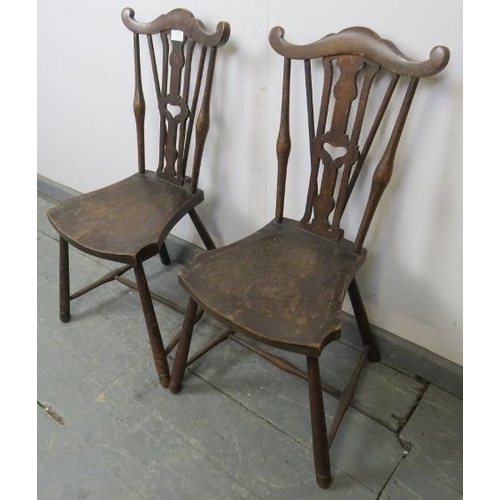 747 - A pair of Edwardian mahogany stickback child’s chairs, the shaped backsplats with pierced heart deco... 