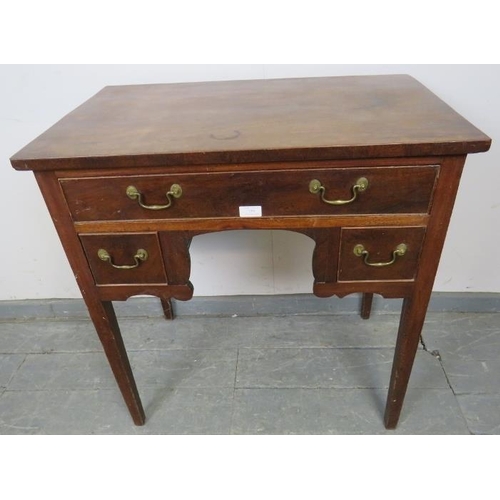 758 - A Georgian mahogany lowboy, housing one long and two short cock-beaded drawers with gilt brass swan-... 