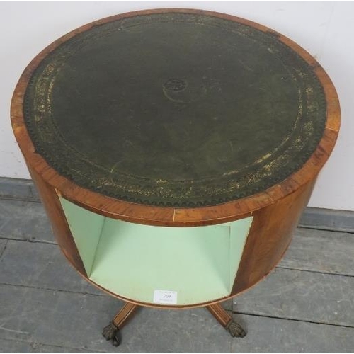 769 - A vintage yew wood revolving cylindrical bookcase in the Regency taste, with gilt tooled green leath... 