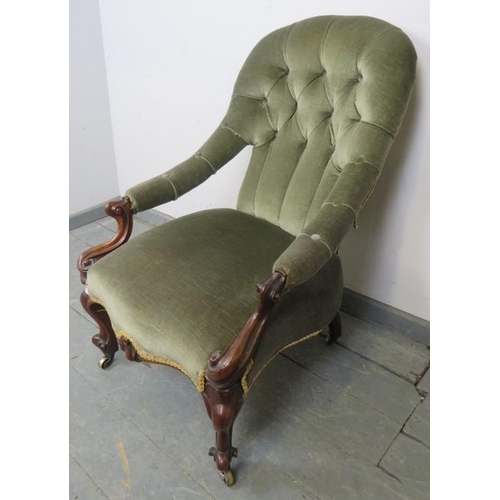 770 - A Victorian mahogany open-sided armchair upholstered in green buttoned velvet material with gold bra... 