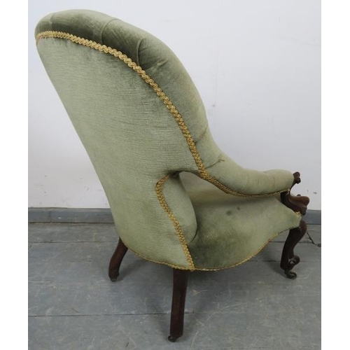 770 - A Victorian mahogany open-sided armchair upholstered in green buttoned velvet material with gold bra... 