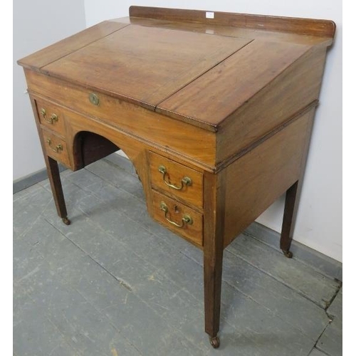 775 - A Georgian mahogany estate manager’s desk, the rising lid opening onto a fitted interior (including ... 