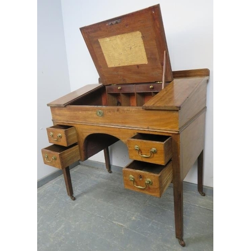 775 - A Georgian mahogany estate manager’s desk, the rising lid opening onto a fitted interior (including ... 