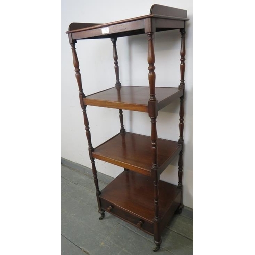 776 - A Victorian mahogany freestanding four-tier whatnot, with ¾ gallery and baluster turned uprights, th... 