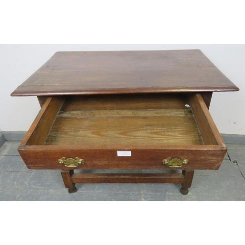 778 - An 18th century oak side table, the single drawer with brass batwing handles, on baluster turned and... 