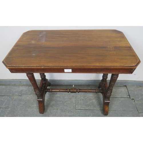 783 - A late Victorian walnut stretcher table, with turned supports and spindles to either end, on reeded ... 