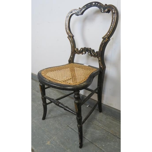 785 - A Victorian Japanned occasional chair with gilt and mother of pearl decoration and bergère seat, on ... 