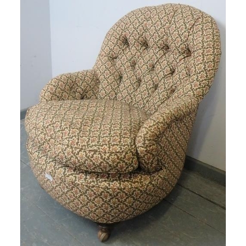 792 - A Victorian tub chair, upholstered in buttoned tapestry material, on tapering supports with castors.... 