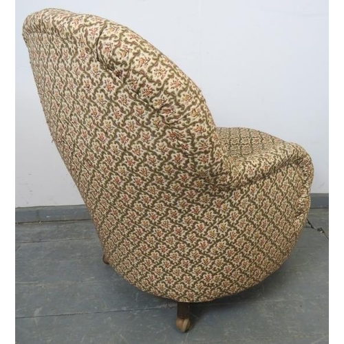 792 - A Victorian tub chair, upholstered in buttoned tapestry material, on tapering supports with castors.... 