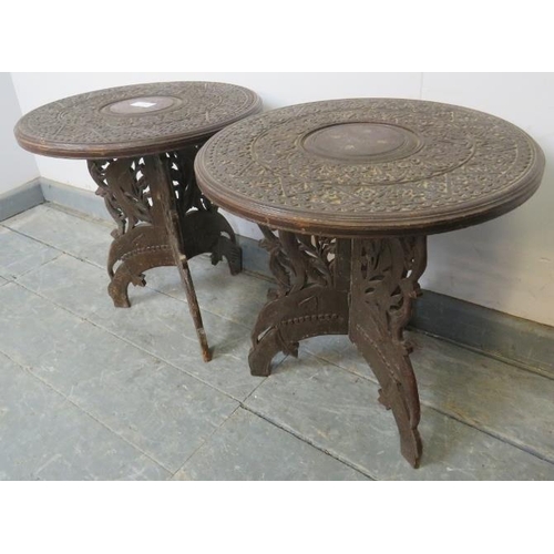 794 - A pair of small early 20th century Anglo Indian hardwood circular occasional tables, with central br... 