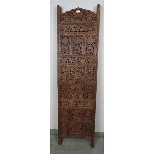 801 - A vintage hardwood Eastern carved and pierced four-section folding screen. 
Condition report: One fo... 