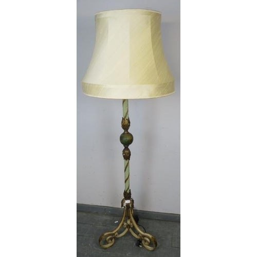 810 - An ornate metal standard lamp in the Florentine taste, with painted rope twist column and gilt acant... 