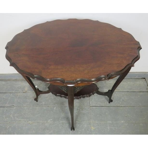 818 - An Edwardian mahogany two-tier occasional table with piecrust edge and pierced fretwork detail to co... 