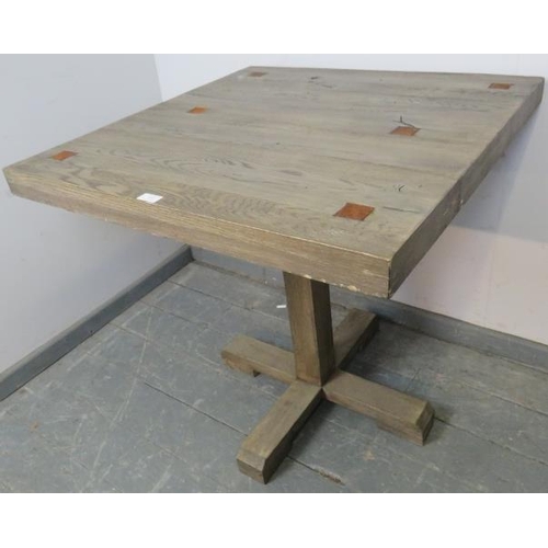 823 - A vintage oak square garden table with metal inserts, painted in a light wash of grey, on a square c... 