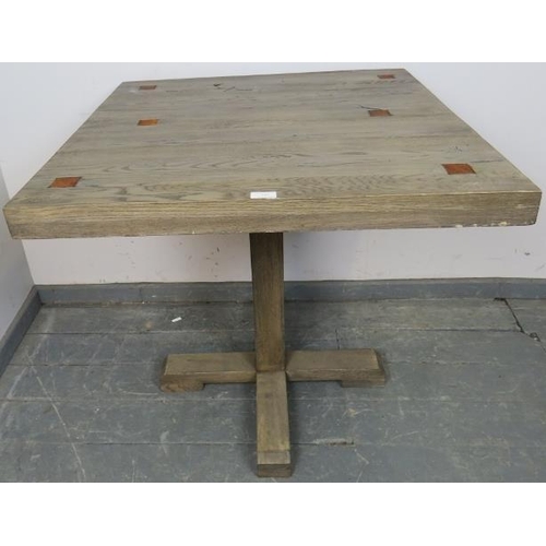 823 - A vintage oak square garden table with metal inserts, painted in a light wash of grey, on a square c... 