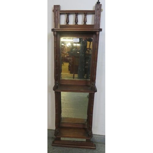 835 - An Edwardian mahogany mirror-back wall mounted shelf with turned uprights and spindles.
Condition re... 